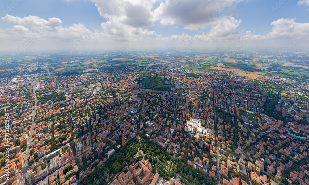 Modena, Italy. Historical Center. Panorama of the city on a summer day. Sunny weather with clouds. Aerial view