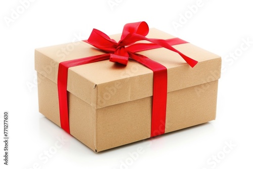 A brown gift box adorned with a vibrant red ribbon and bow, set against a clean white background