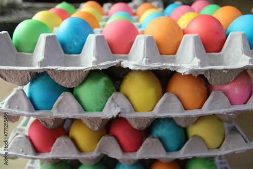 colored eggs in stacked cartons © Chiara Sakuwa