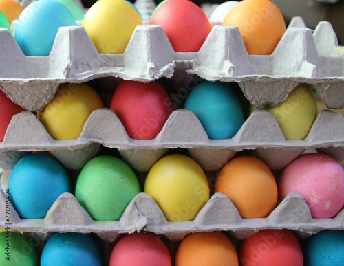 colorful eggs in stacked cartons © Chiara Sakuwa