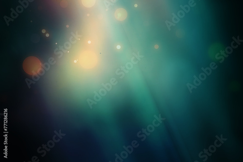 defocused warm lights with blurry stripes on a green background with vignette