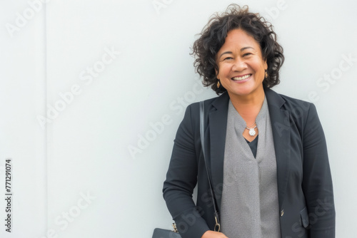Filipina Businesswoman Smiling with Confidence, Professional in Modern Corporate