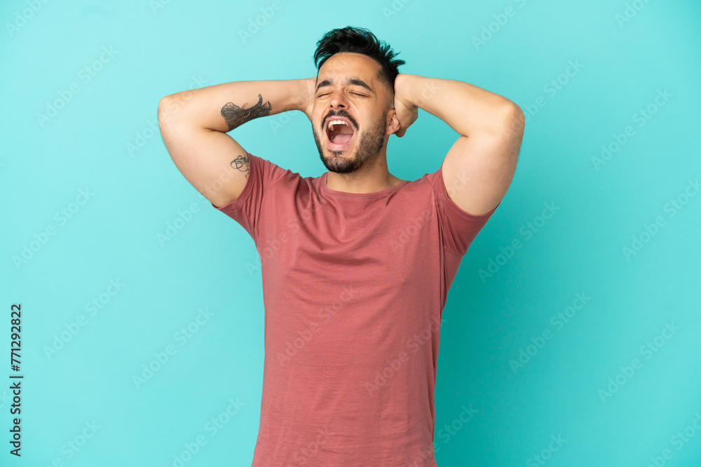 Young caucasian man isolated on blue background stressed overwhelmed Young caucasian man isolated on blue background stressed overwhelmed