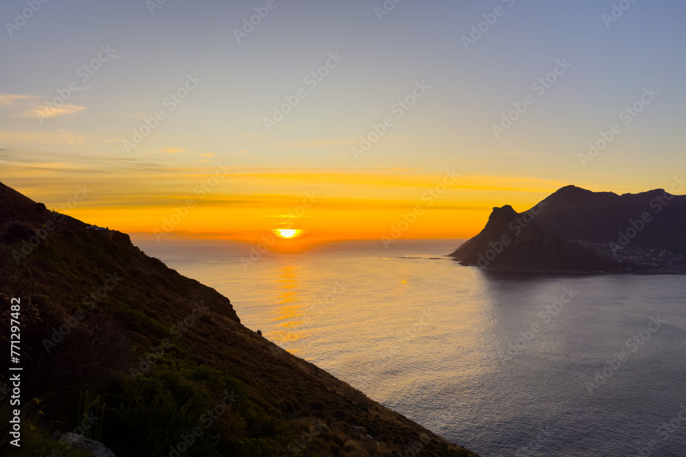 Hout Bay coastal mountain landscape at sunset in Cape Town.