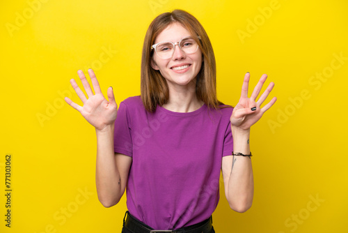 Young English woman isolated on yellow background counting nine with fingers