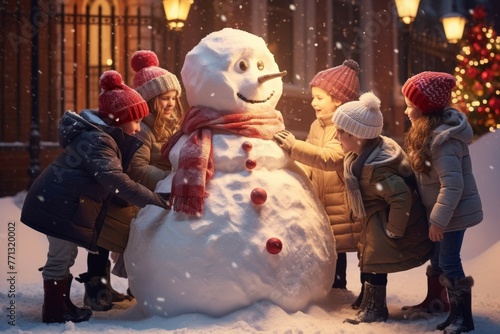 Children building snowman with Christmas tree in background