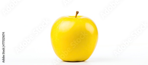 A single yellow apple with ...