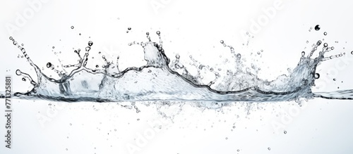 An up-close view of a water splash captured in motion, isolated against a clean white background