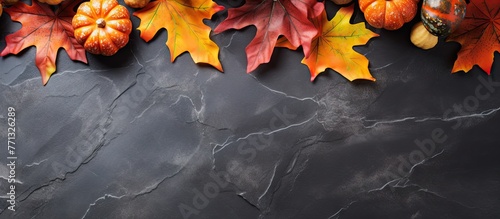 Autumn leaves and pumpkin a...