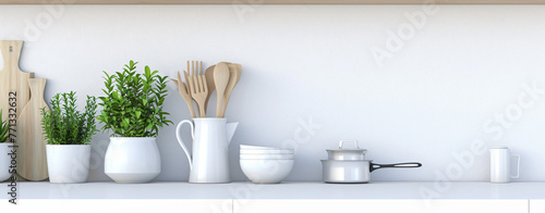 white kitchen utensils on a white shelf with plant on t 94b58ed0-e1c9-4c27-8811-3da8eb8744df photo