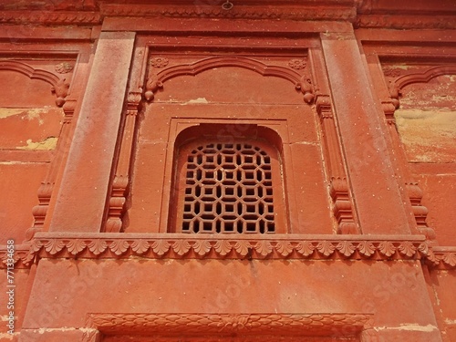 Carved palace exterior wall showcasing intricate designs and patterns, RAMNAGAR FORT, VARANASI, UTTAR PRADESH, INDIA  photo