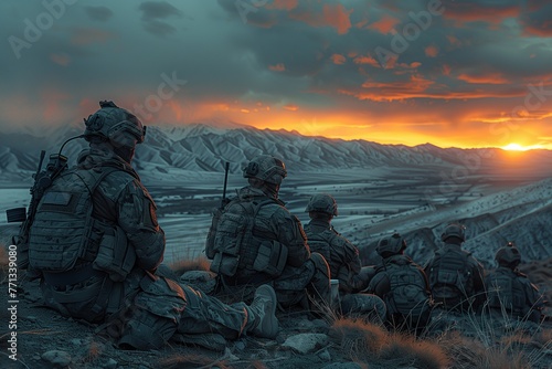 Silhouetted against a fiery sunset, a squad of special forces soldiers takes a moment to rest and survey the mountainous landscape before them.