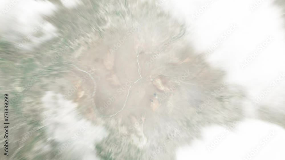 Earth zoom in from space to Bardere, Somalia. Followed by zoom out through clouds and atmosphere into space. Satellite view. Travel intro. Images from NASA Earth zoom in from space to Bardere, Somalia. Followed by zoom out through clouds and atmosphere into space. Satellite view. Travel intro. Images from NASA