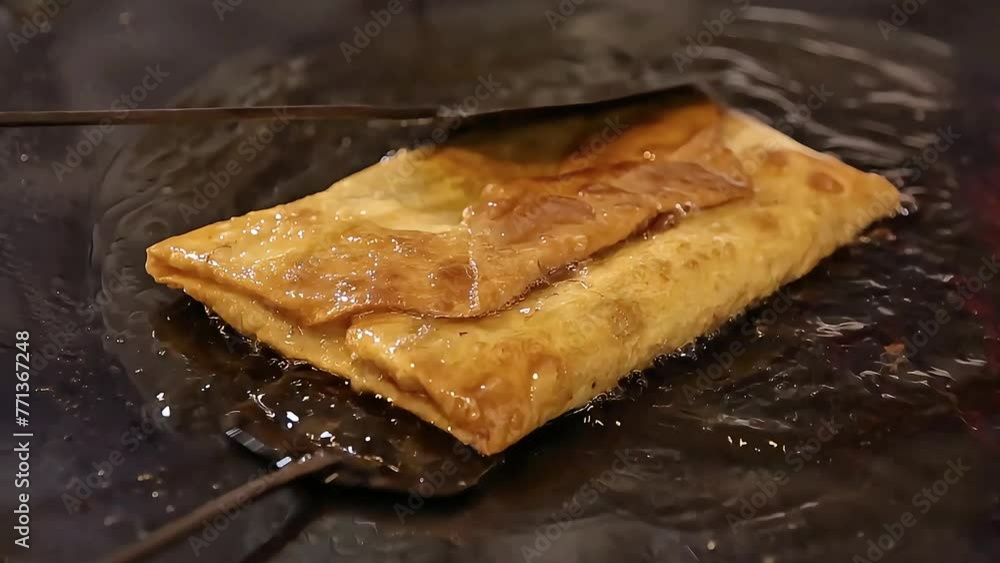 Frying egg martabak while behind the egg martabak, Street Food Frying egg martabak while behind the egg martabak, Street Food