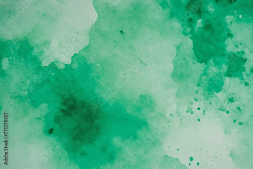 Green watercolor background texture, blotches of watercolor paint, textured grainy paper, light mint green wash with abstract blob design