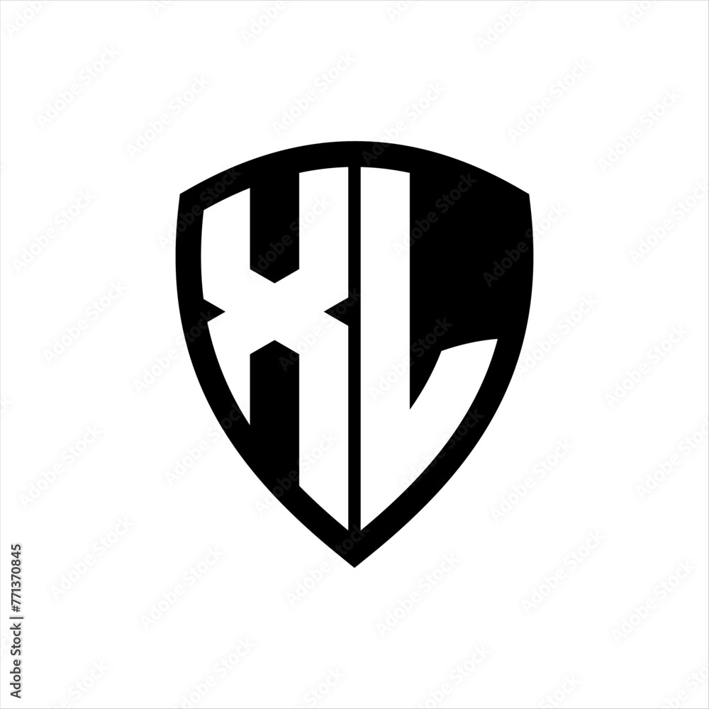 XL monogram logo with bold letters shield shape with black and white color design XL monogram logo with bold letters shield shape with black and white color design