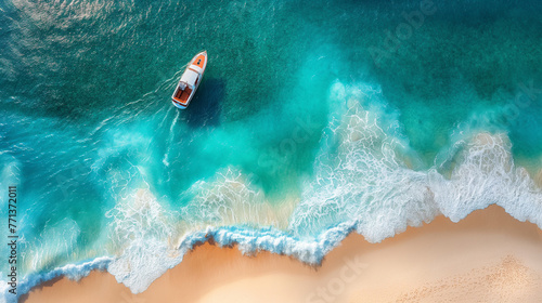 Wave and boat on the beach as a background. Beautiful natural background at the summer time from air.