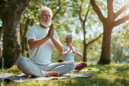 Senior couple doing yoga.