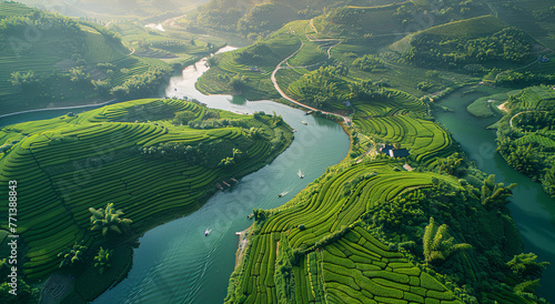 a river running through a lush green valley photo