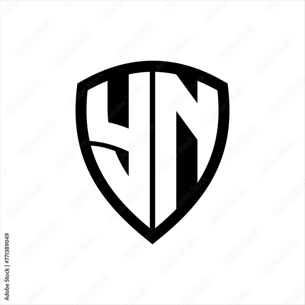 YN monogram logo with bold letters shield shape with black and white color design YN monogram logo with bold letters shield shape with black and white color design