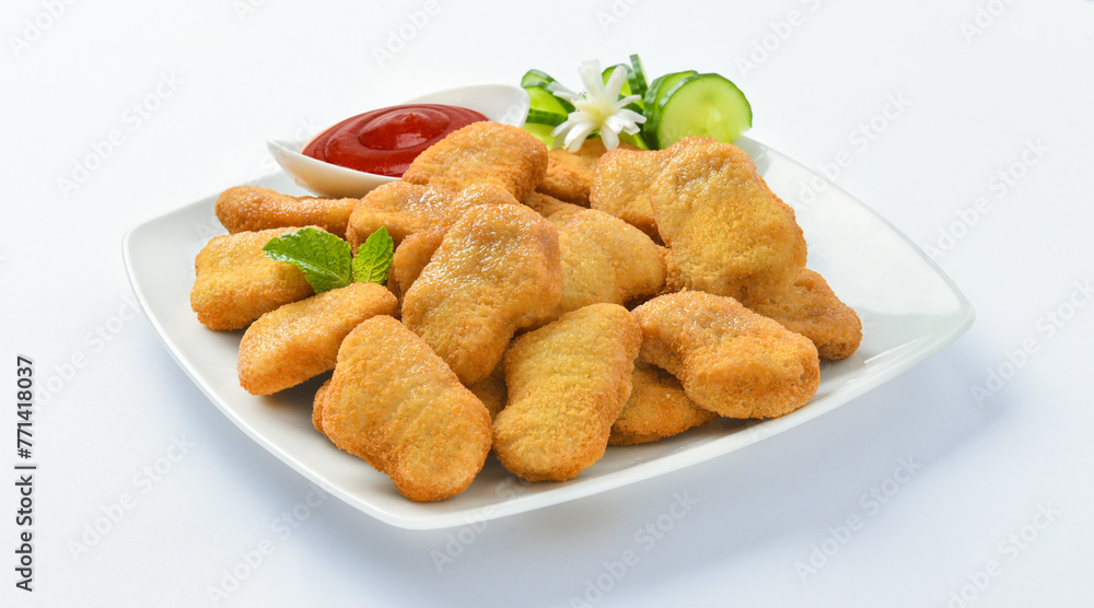 Chicken Nuggets. A chicken nugget is a food product consisting of a small piece of deboned chicken meat that is breaded or battered, then deep-fried or baked. Chicken Nuggets. A chicken nugget is a food product consisting of a small piece of deboned chicken meat that is breaded or battered, then deep-fried or baked.
