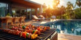Indulge in a luxurious poolside BBQ party amidst lush palms and delectable skewered delicacies.