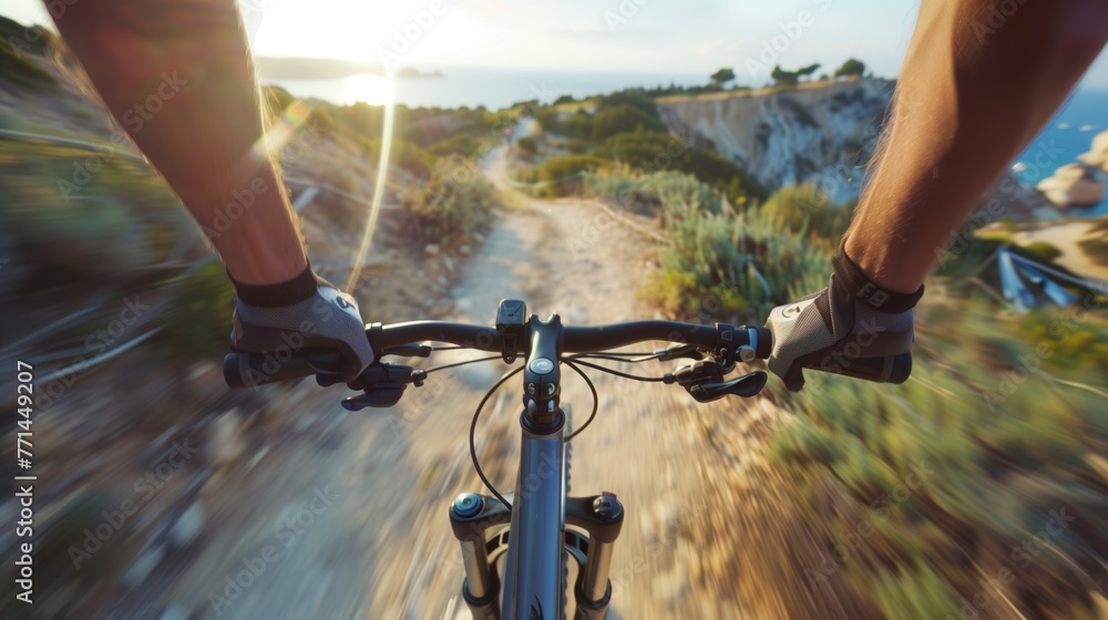 Naklejka premium Cyclist POV on Coastal Trail at Sunset