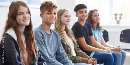 A group of teenagers at an orthodontic clinic waiting for their appointments. 
