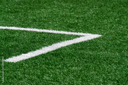 Green Turf and White Line Athletic Field Background