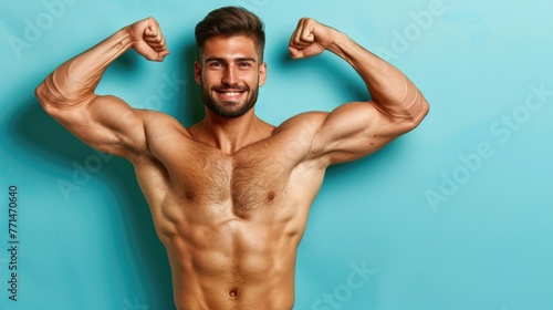 A cheerful man flexing muscles with a blue background.