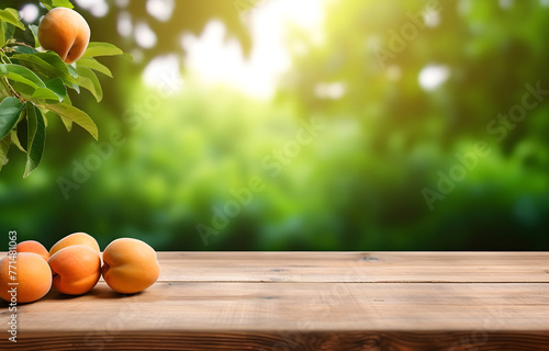 apricot fruit on wooden table on blurred nature citrus trees gar