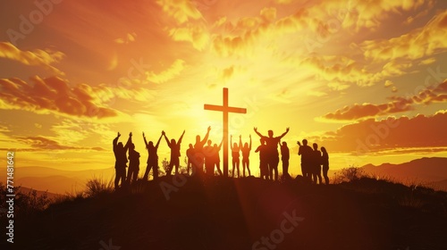 Silhouette of people with raised hands worshipping at cross during a vibrant sunset