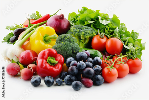 A variety of fruits and vegetables are displayed on a white background. Concept of abundance and health, as it showcases a diverse selection of fresh produce. The arrangement of the fruits