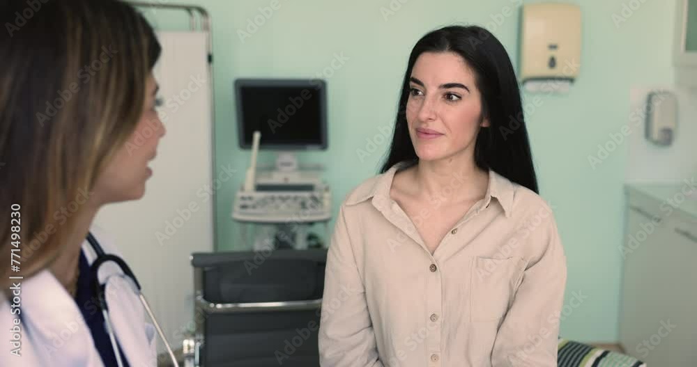 Young 30s Latin woman patient shake hand female physician, got professional medical care, receive advice, feel satisfied with treatment plan, express respect and gratitude handshaking in clinic office Young 30s Latin woman patient shake hand female physician, got professional medical care, receive advice, feel satisfied with treatment plan, express respect and gratitude handshaking in clinic office