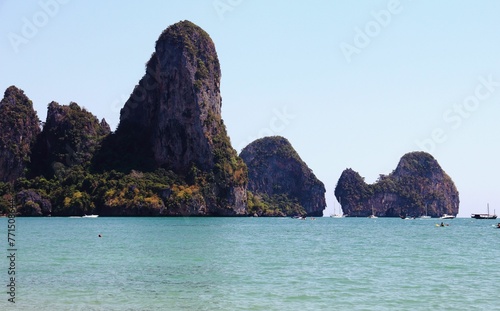 Tranquil seascape with majestic cliffs in the background. Thailand  Railay Beach.