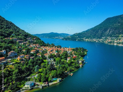Breathtaking view of Lake Como with majestic mountains in the backdrop, Italy.