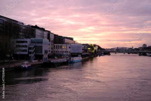 A view of the Seine River at dusk. Paris, France - March 18, 2024.