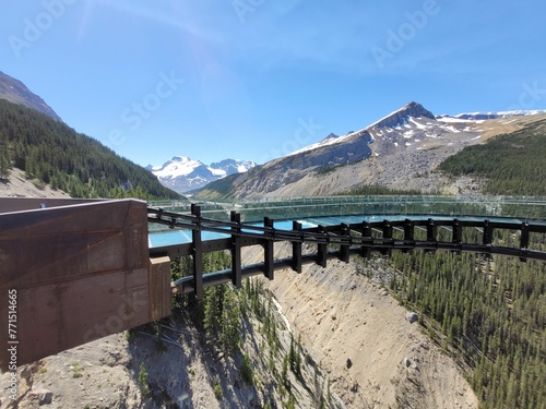 View of the Columbia Icefield Skywalk, a glass-floored walkway built on the edge of a cliff photo