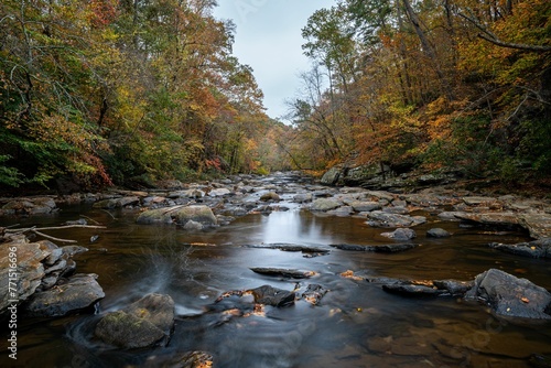 Sope Creek stream winding through a rocky landscape during fall   Mareitta  GA