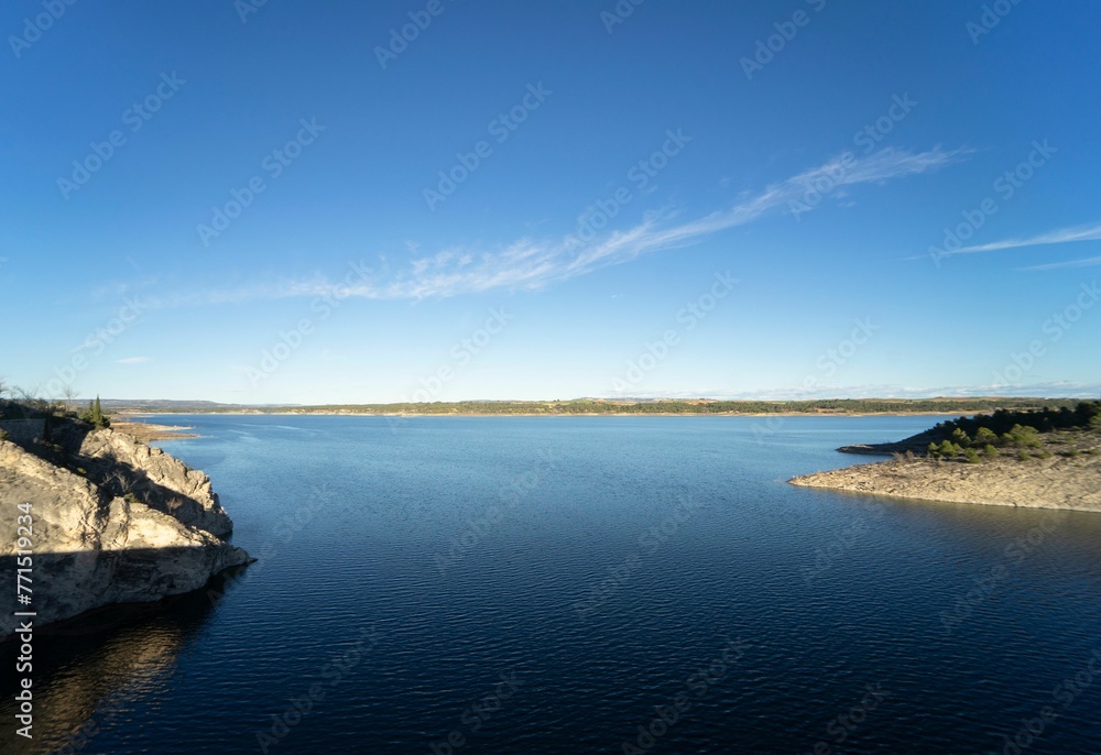 Reservoir with water in Buendia at sunset in Guadalajara, Spain Reservoir with water in Buendia at sunset in Guadalajara, Spain