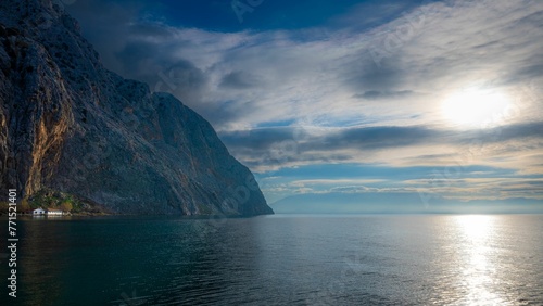 view of cliffs overlooking the sea, taken from a boat photo