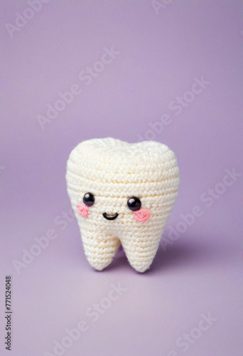 Knitted cute tooth toy, amigurumi style, pediatric dentistry