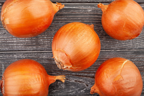 onions group on wood background top view