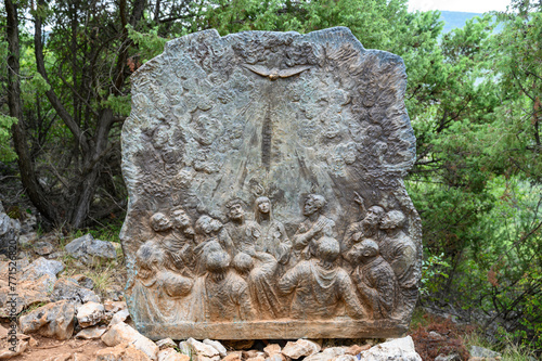 The Descent of the Holy Spirit – Third Glorious Mystery of the Rosary. A relief sculpture on Mount Podbrdo (the Hill of Apparitions) in Medjugorje. photo