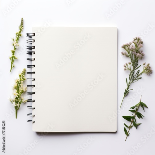 notebook with green leaf