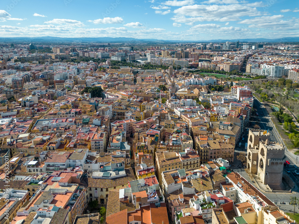 Obraz premium Aerial view of European city Valencia, Spain. Beautiful skyline of Valencia. Panoramic view of all city. Famous travel destination visited annually by many foreign tourists. Rooftop of Valencia. 