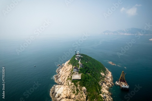 Aerial shot of the Lighthouse of Waglan Island in Hong Kong photo