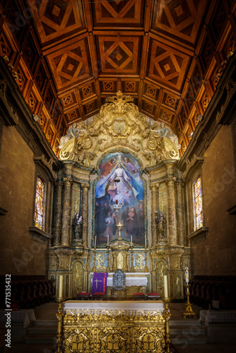 elaborate ornate church interior depicting religious scenes showing the alter and portico s