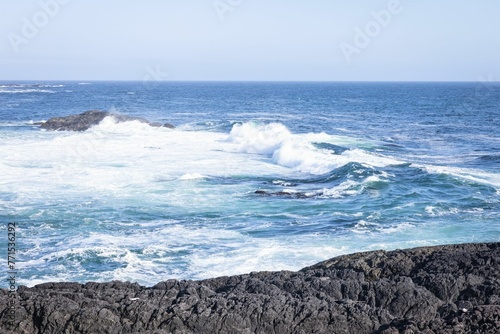 Beautiful shot of waves crashing onto the shoreline near Ucluelet, British Columbia photo