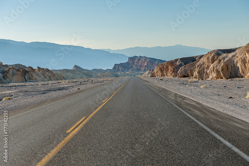 Driving in Death Valley. Death Valley National Park in Inyo County of Mojave Desert, California is the hottest place on earth with a temperature of 56,7 °C recorded in 1913. photo